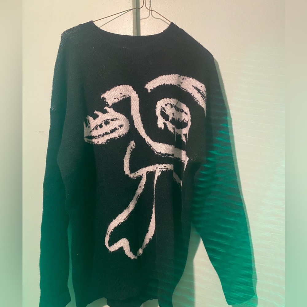 Black sweater, good for the winter and fall. It’s for outdoor and indoor. Comfy